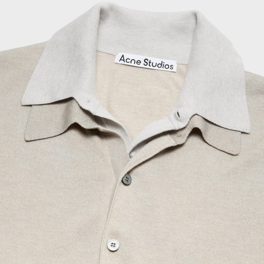 Tasoni Acne Studios beige and grey layered knit sweater with a V-neck and button closure.