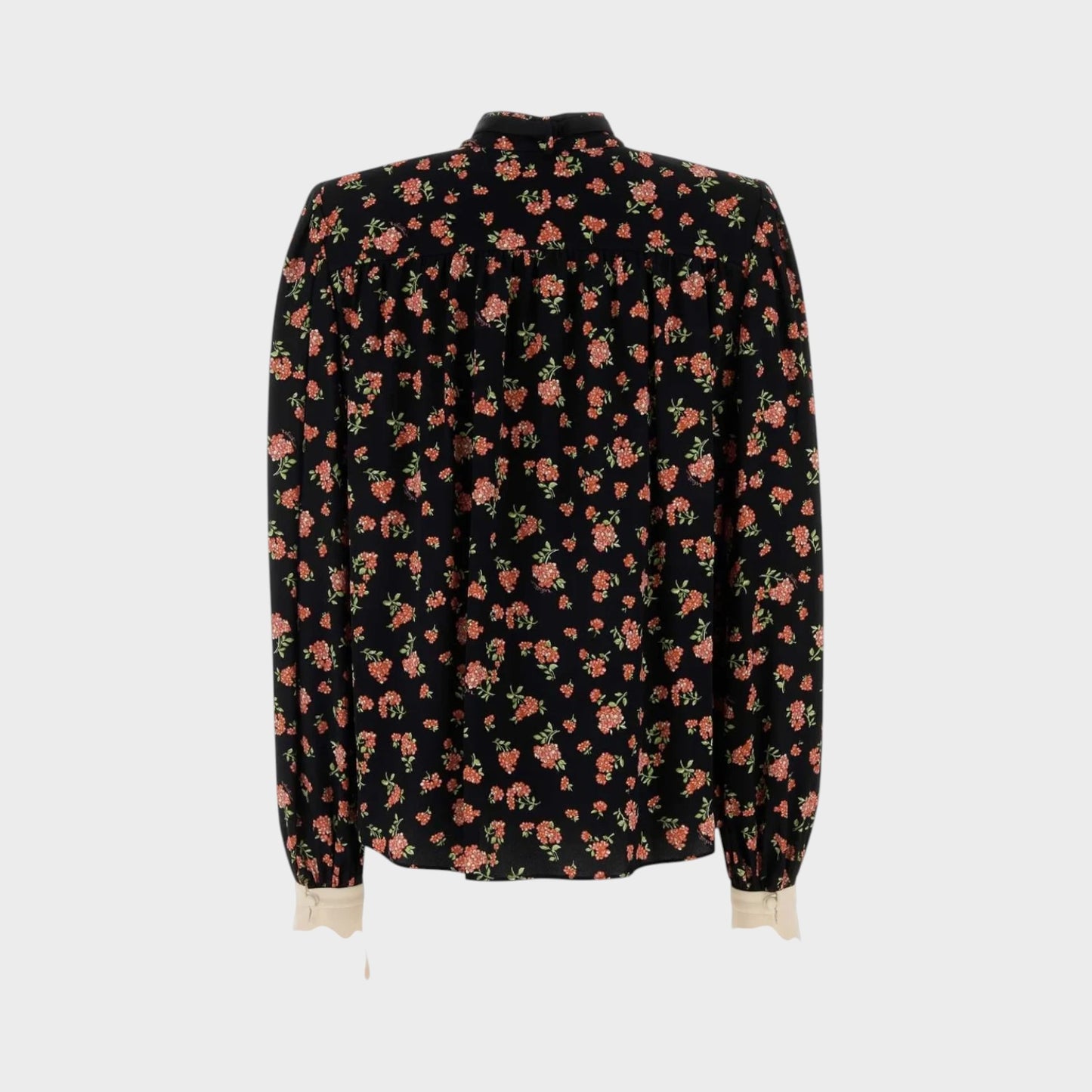 Tasoni black long-sleeve shirt with multicolor floral print and cream cuffs.