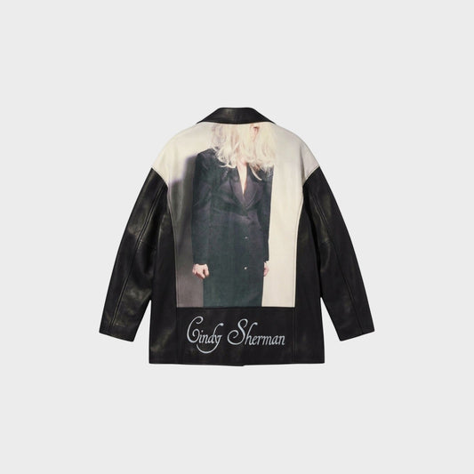Tasoni black leather blouson coat with a printed image of Cindy Sherman and her signature.