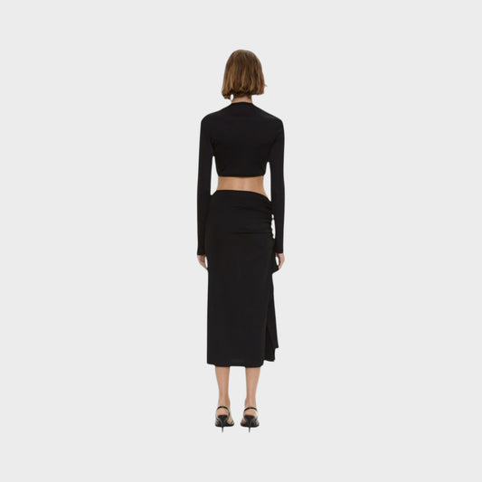 Tasoni Christopher Esber black ribbed long sleeve crop top with crystal pendant detail, back view on model.