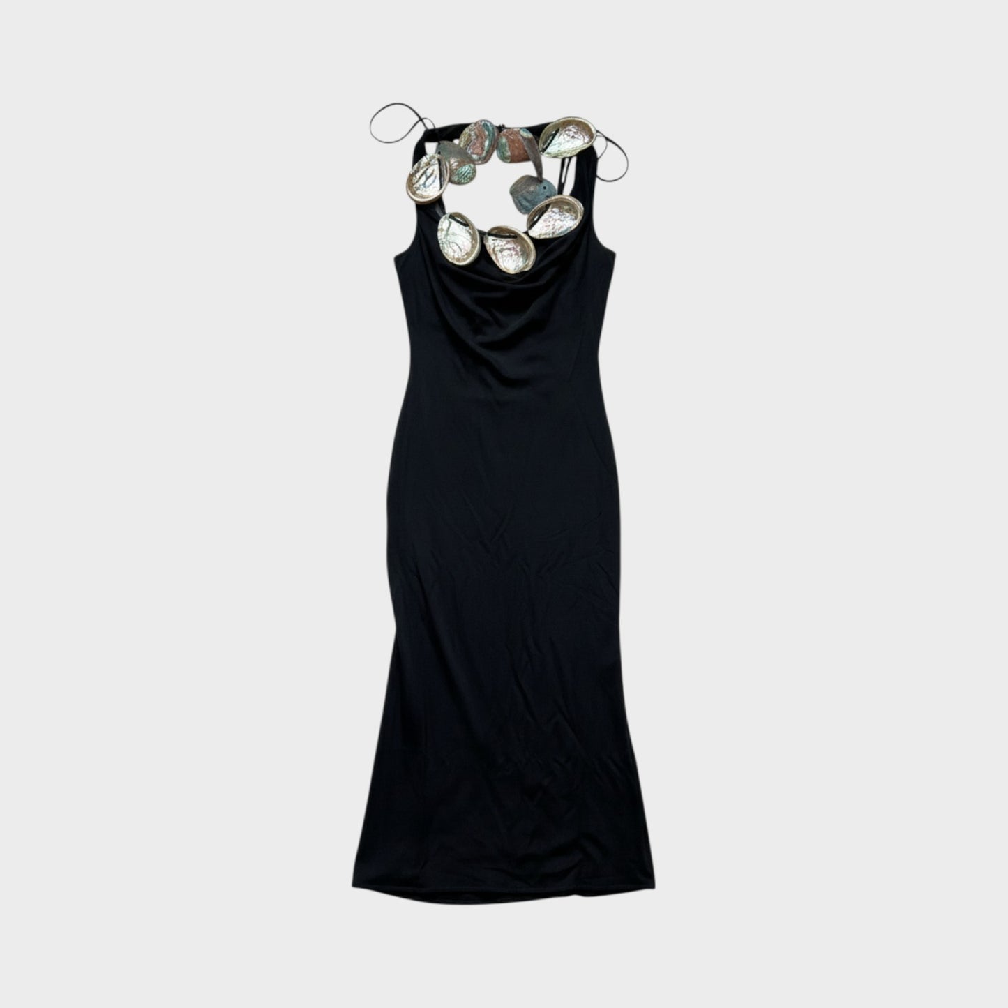 Tasoni Conner Ives black mini dress featuring a cowl neckline and decorative abalone shell embellishments.
