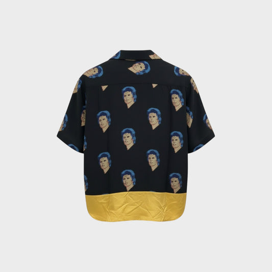 Tasoni black silk blend short sleeve shirt with repeating David Bowie graphic print and gold hem.