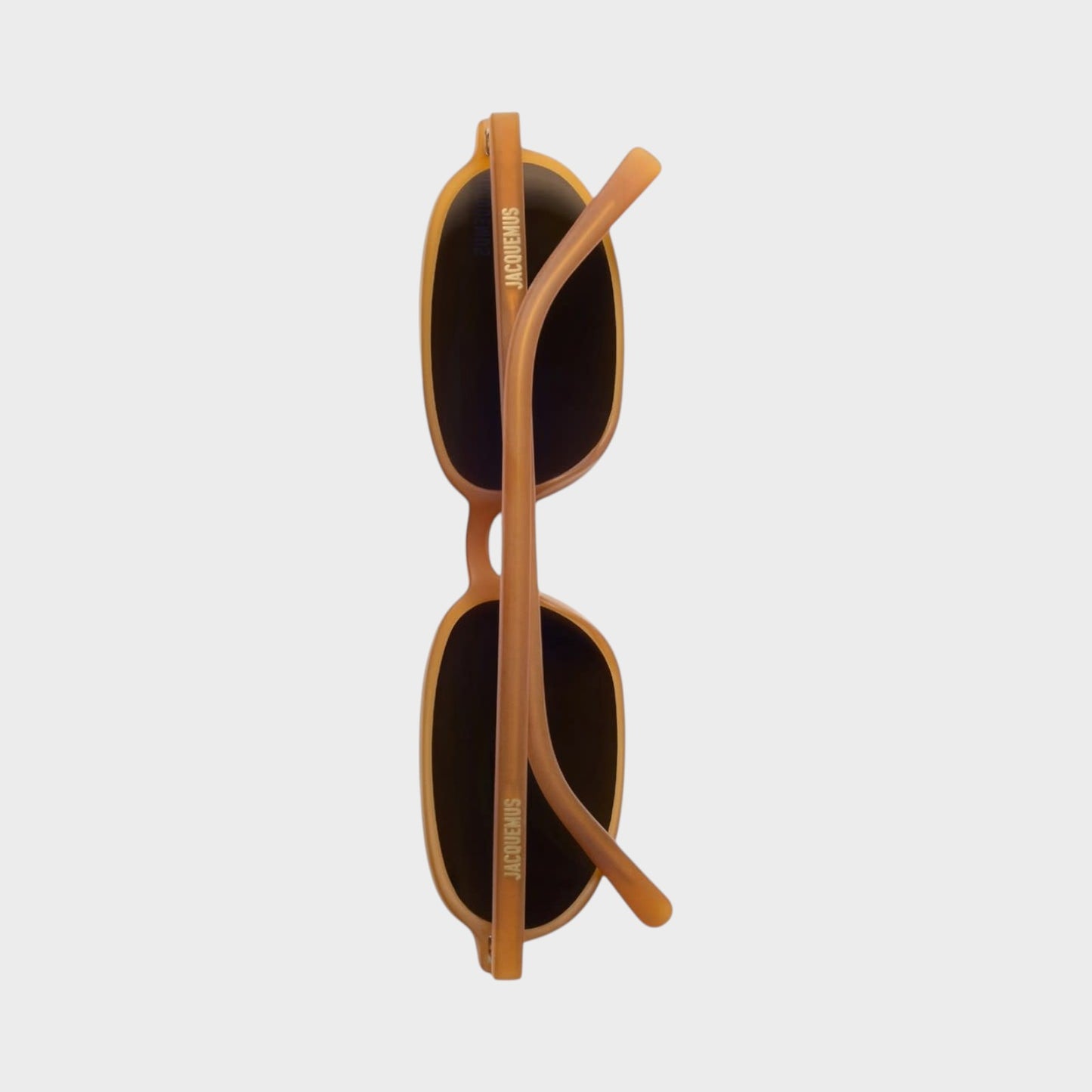 Tasoni Jacquemus Les Lunettes Jac227 sunglasses in orange matt with black lenses and logo detail on arms.