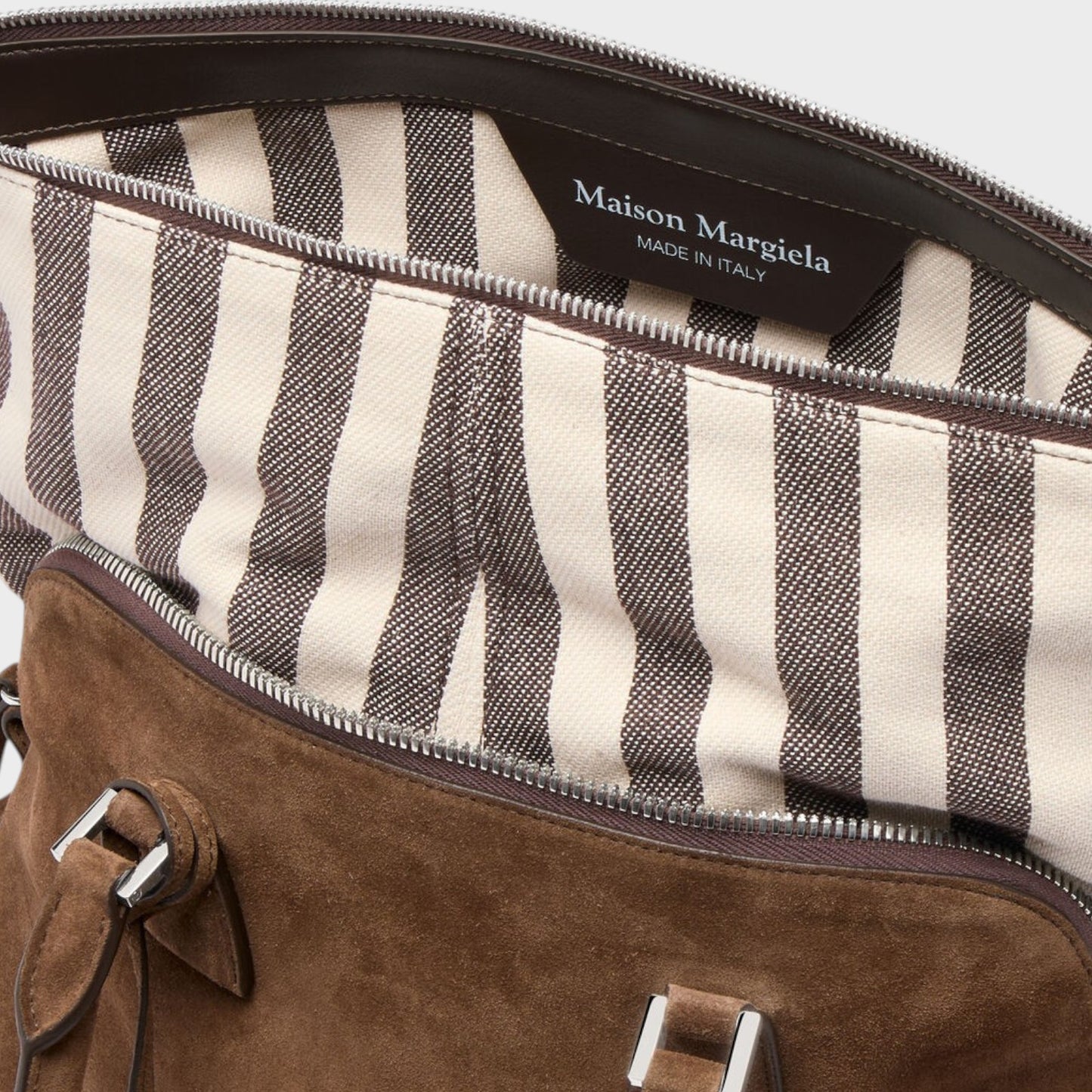 Tasoni: Maison Margiela brown suede leather medium bag with striped lining and silver hardware.