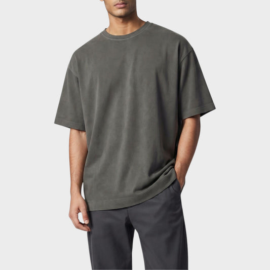 Model wearing a Tasoni Massimo Alba Nevis charcoal grey cotton t-shirt with a relaxed fit and crew neck.