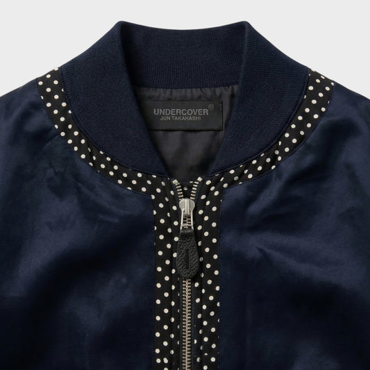 Tasoni navy satin bomber jacket with polka dot trim and zip closure.