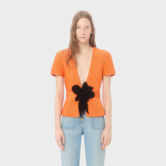 Tasoni orange pleated short sleeve jacket with V-neck and black floral detail