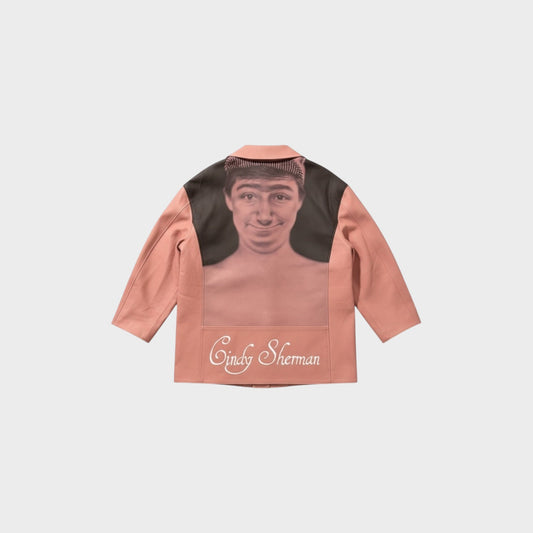 Tasoni pink leather coat with a portrait appliqué on the back and