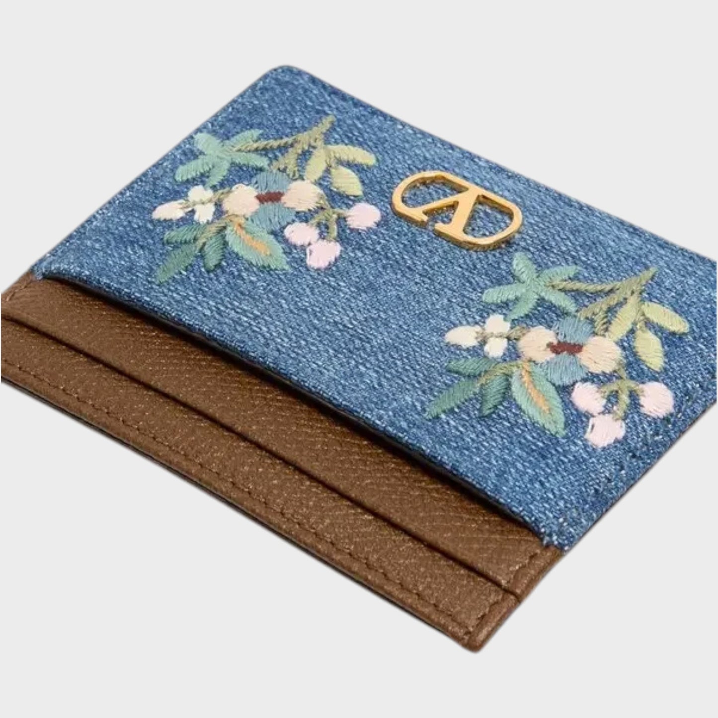 Tasoni Valentino V-Logo Signature denim card holder in blue with floral embroidery and gold hardware.