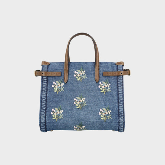 Tasoni Valentino small denim tote bag with multicolor flower bouquet embroidery and brown leather handles.