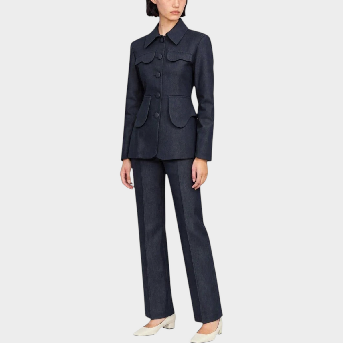 Tasoni Destree dark blue denim suit featuring a structured jacket with flap pockets and matching wide leg trousers.