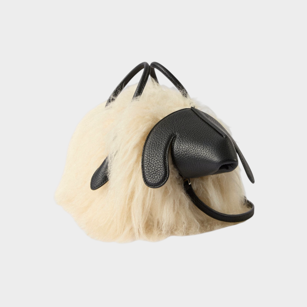 Tasoni Jacquemus Le Petit Turismo small bowling bag in off-white shearling and black leather with animal-like design