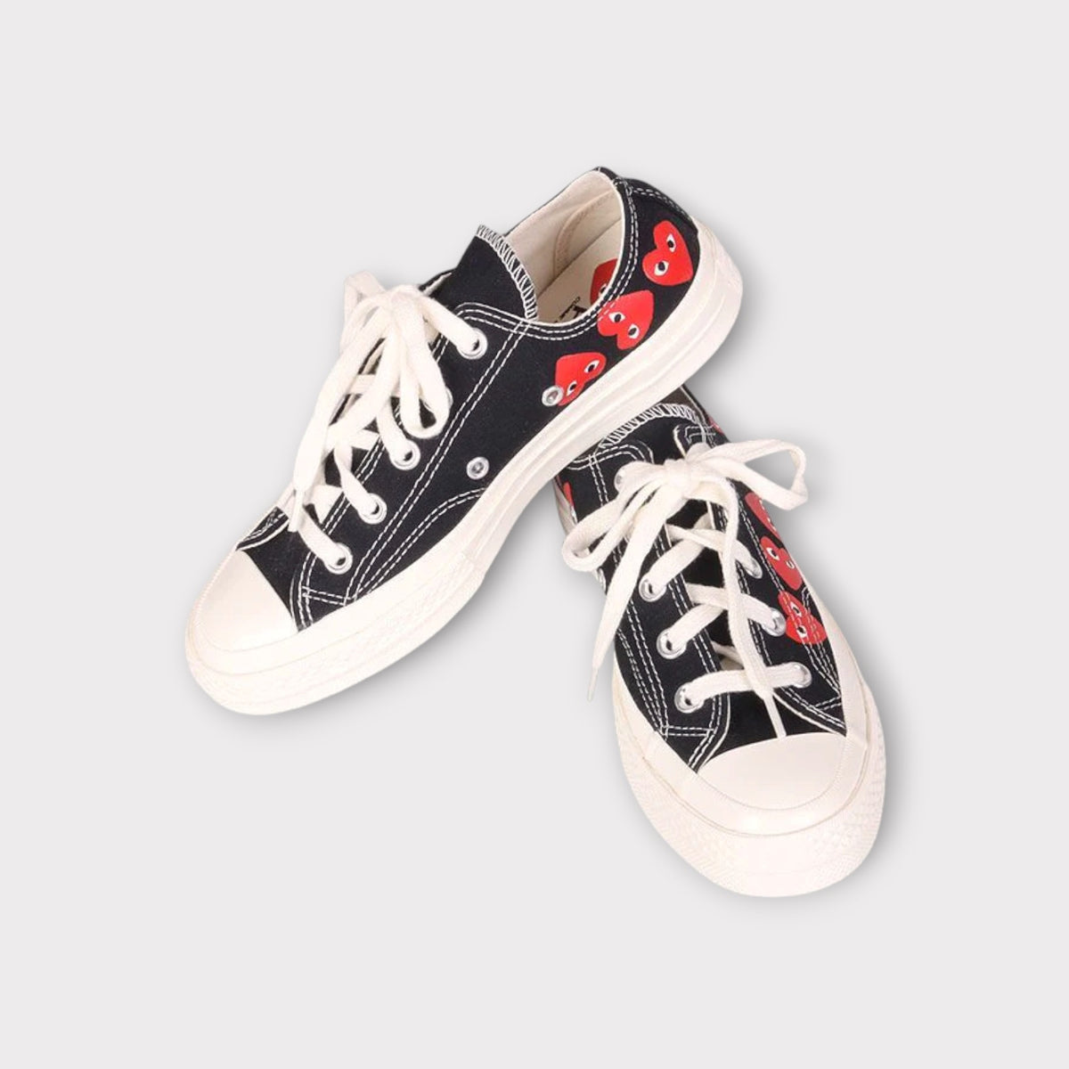 Comme des Garçons Play x Converse Chuck Taylor Low Top Sneaker