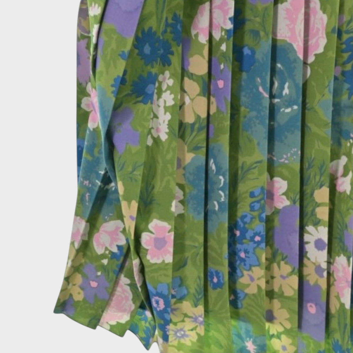 Tasoni Balenciaga floral print semi-fitted dress featuring green fabric with pink and purple flowers and pleat detail