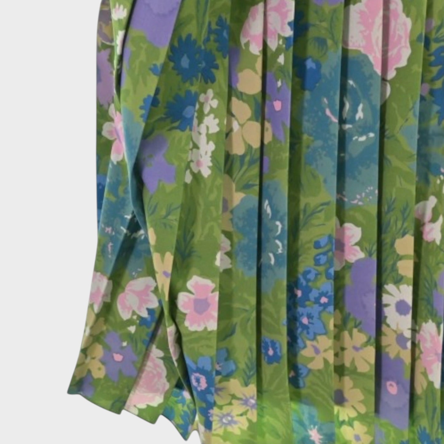 Tasoni Balenciaga floral print semi-fitted dress featuring green fabric with pink and purple flowers and pleat detail