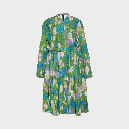 Tasoni Balenciaga semi-fitted floral print dress in green with blue and pink flowers and pleated skirt detail.
