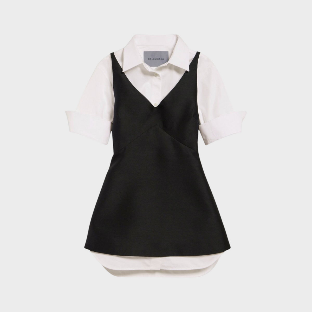 Tasoni Balenciaga wool and silk hybrid shirt dress featuring a white short-sleeve shirt layered under a black bodice.
