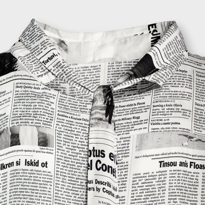 Tasoni Balenciaga light satin long sleeve dress featuring a black and white newspaper print with a crew tie neck.
