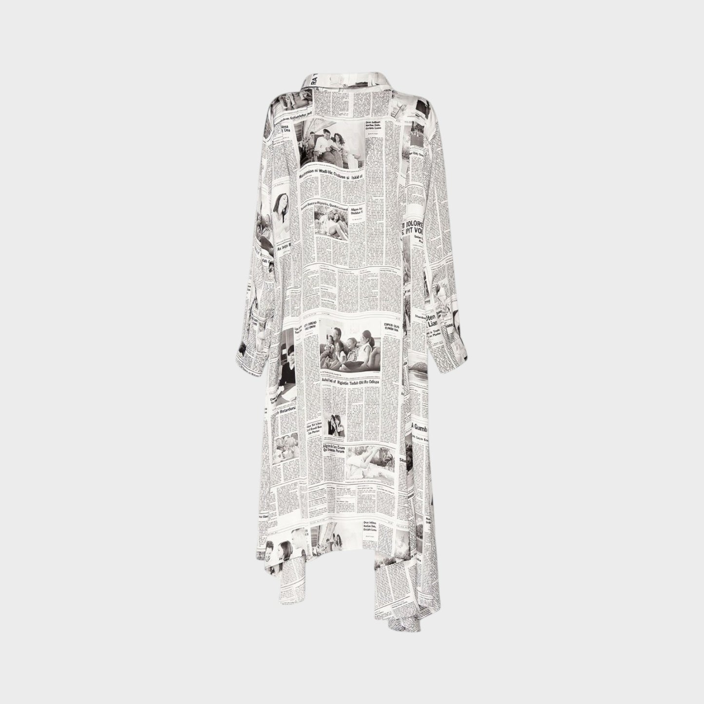 Tasoni Balenciaga long sleeve satin dress featuring a black and white newspaper Happy News print and tie neck detail.