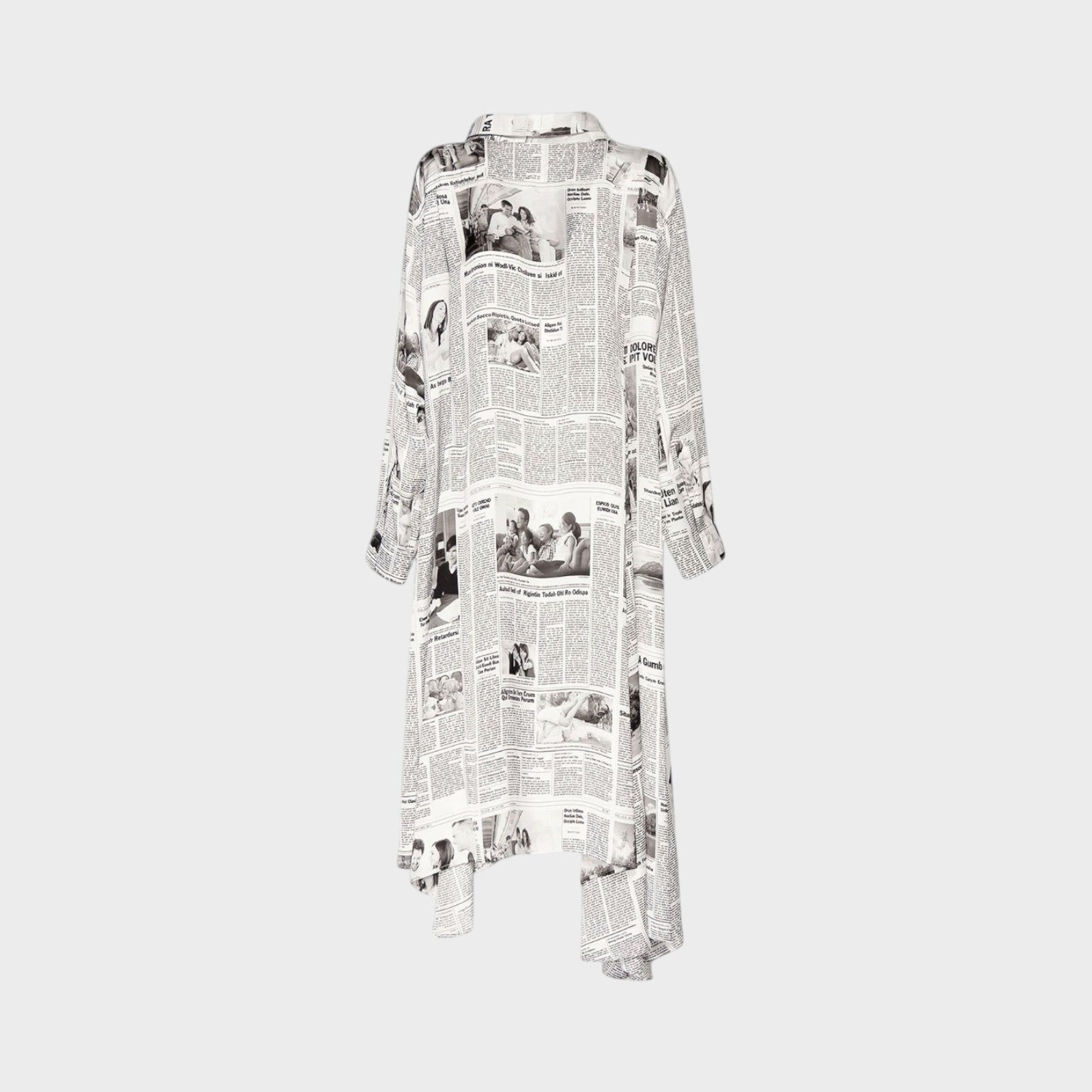 Tasoni Balenciaga long sleeve satin dress featuring a black and white newspaper Happy News print and tie neck detail.