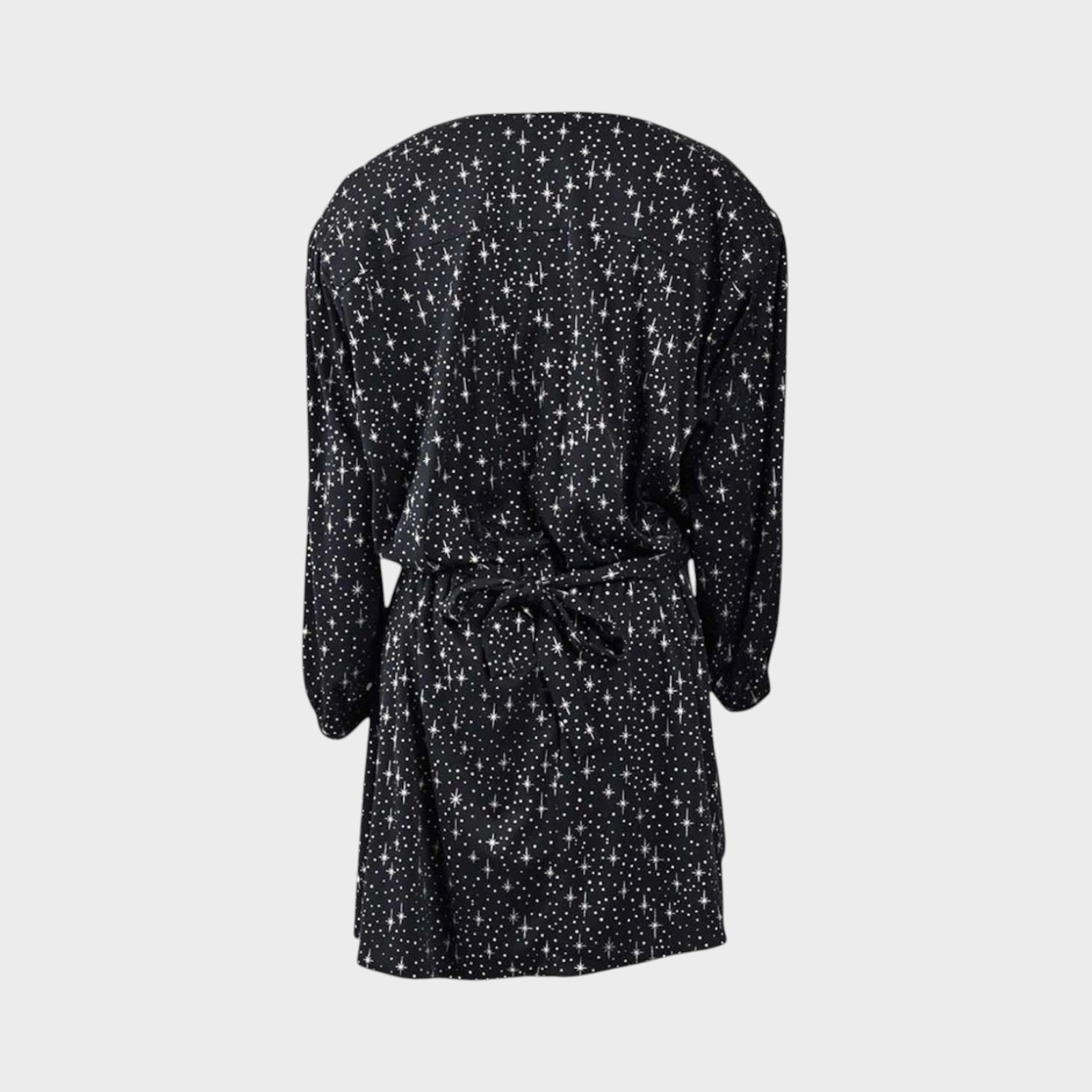 Tasoni Balenciaga black mini dress featuring a white star print, V-neckline, and long sleeves, back view.
