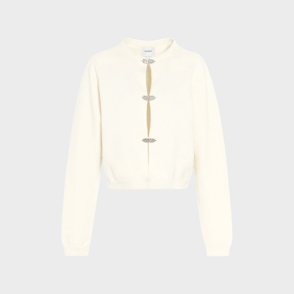 Tasoni Barrie cream cashmere cardigan featuring three decorative crystal strass button closures on the front.