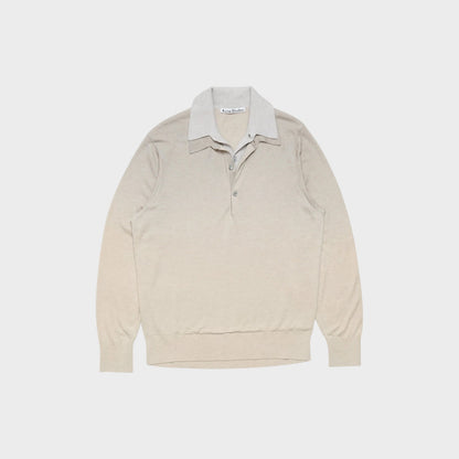 Tasoni beige and grey layered V-neck sweater in silk and cashmere blend. Features a contrasting collar and button placket.