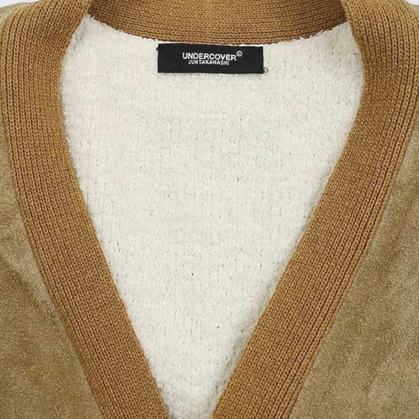 Tasoni beige suede and wool blend cardigan with a cream textured interior and brown knit trim.