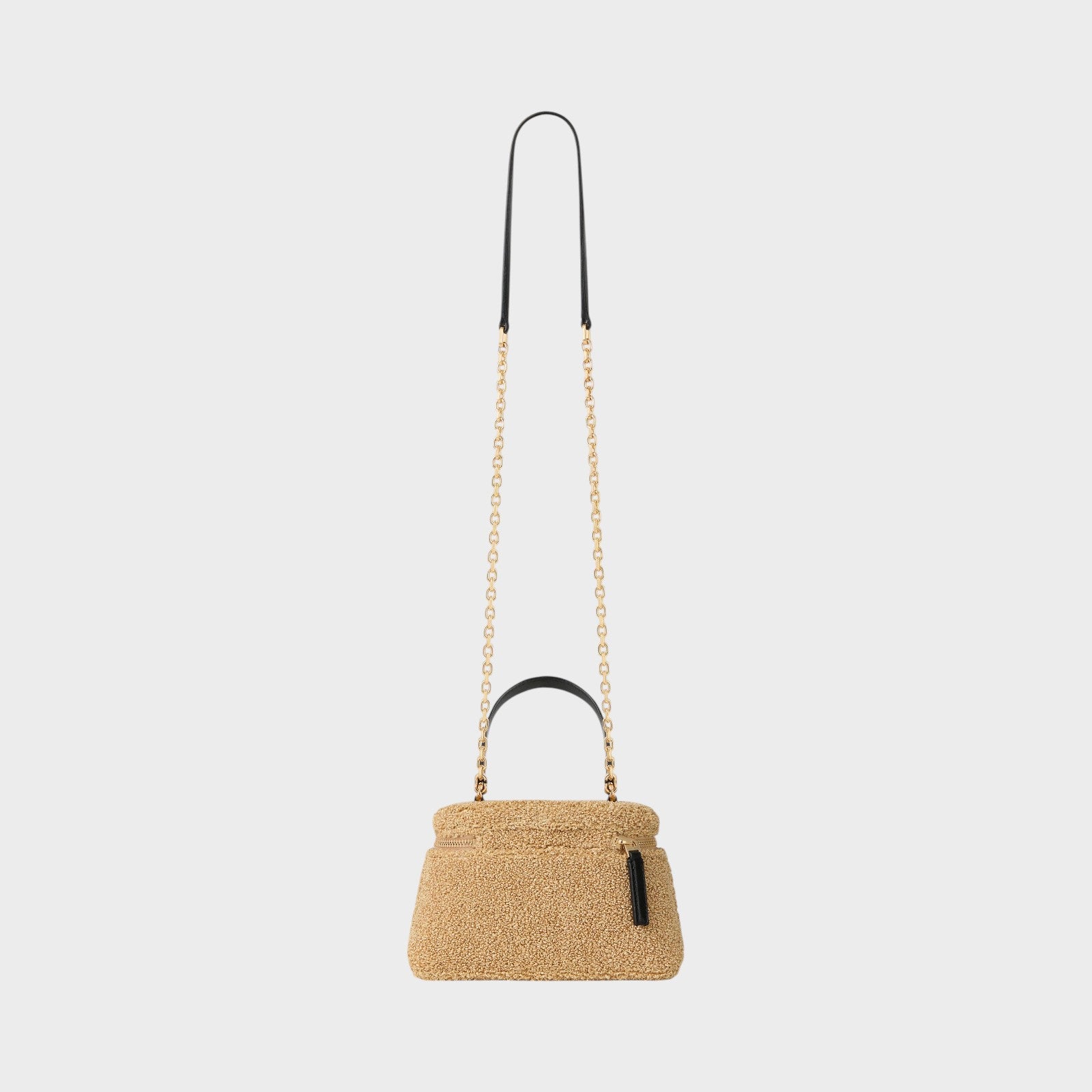 Tasoni beige teddy fabric Antigona bag with gold chain strap and black leather top handle.