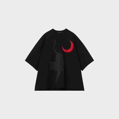 Tasoni black cotton t-shirt with a black embroidered cat and red crescent moon graphic.