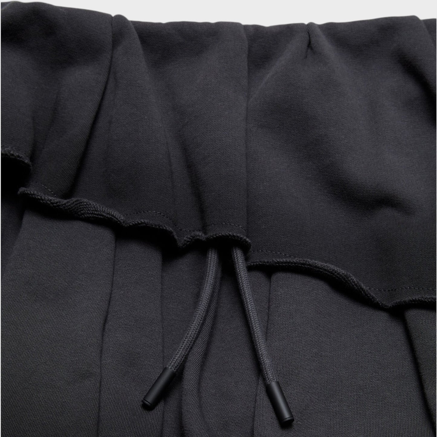 Tasoni black cotton tiered mini skirt with drawstring waist and raw hem details.