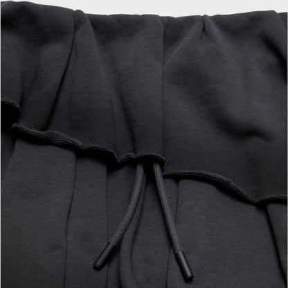 Tasoni black cotton tiered mini skirt with drawstring waist and raw hem details.