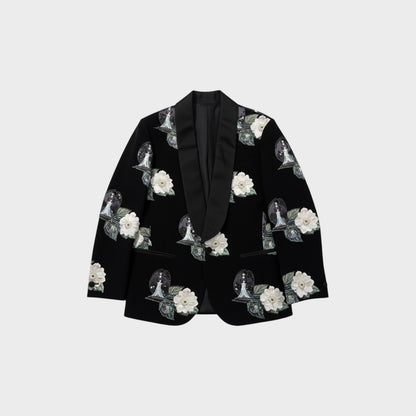 Tasoni black single-breasted blazer with embroidered roses and a figure in a snow globe print. Features satin lapels.