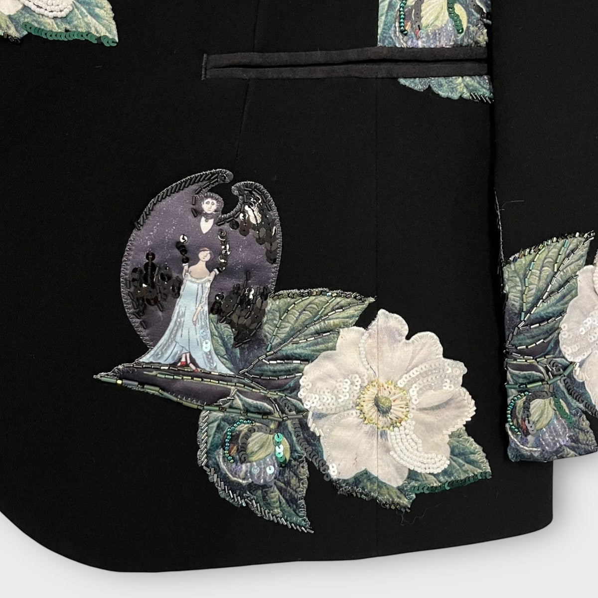 Tasoni black single-breasted blazer with embroidered floral and figural patches, sequins, and beading.