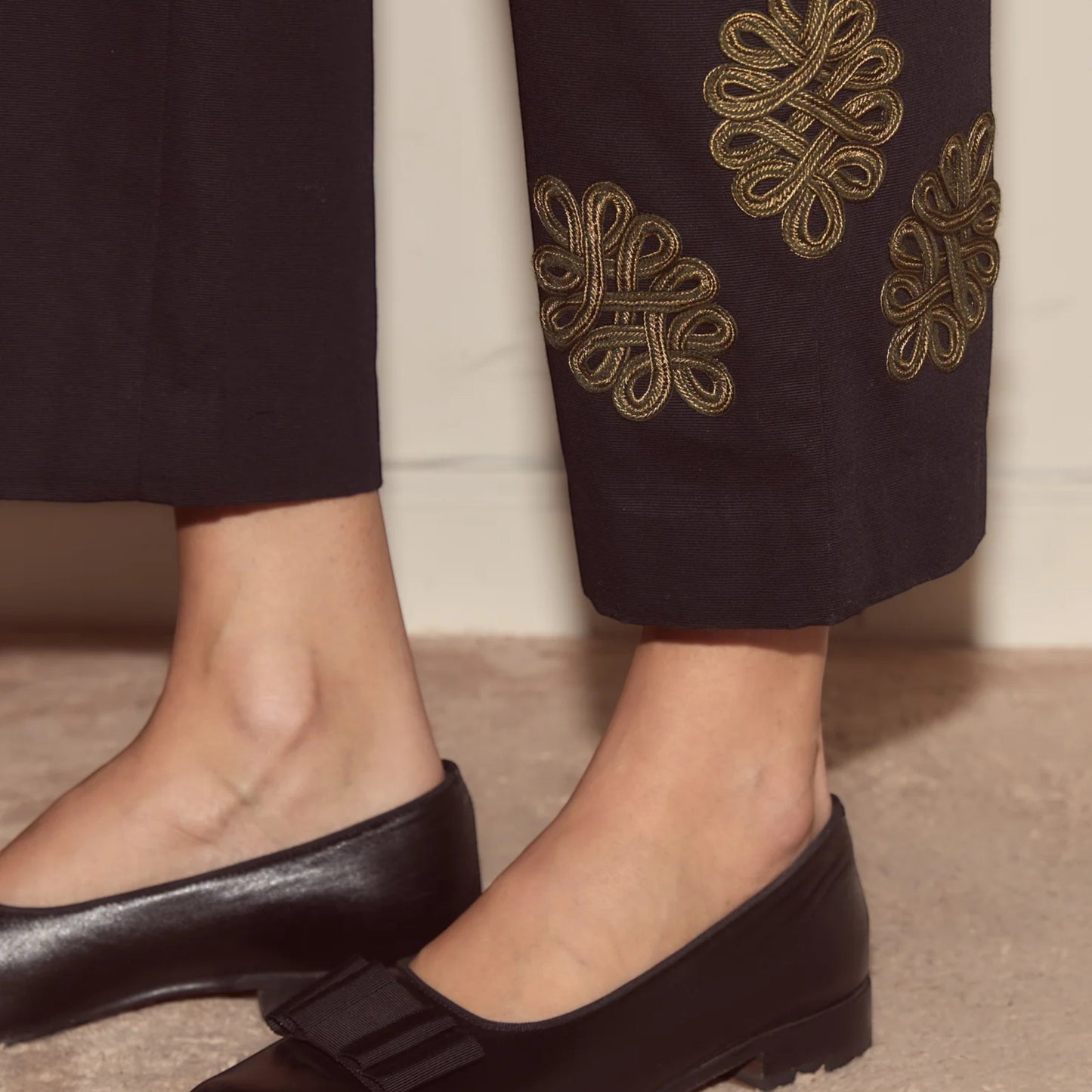 Tasoni black looped frog high-waisted straight-leg trousers with gold embroidery detail