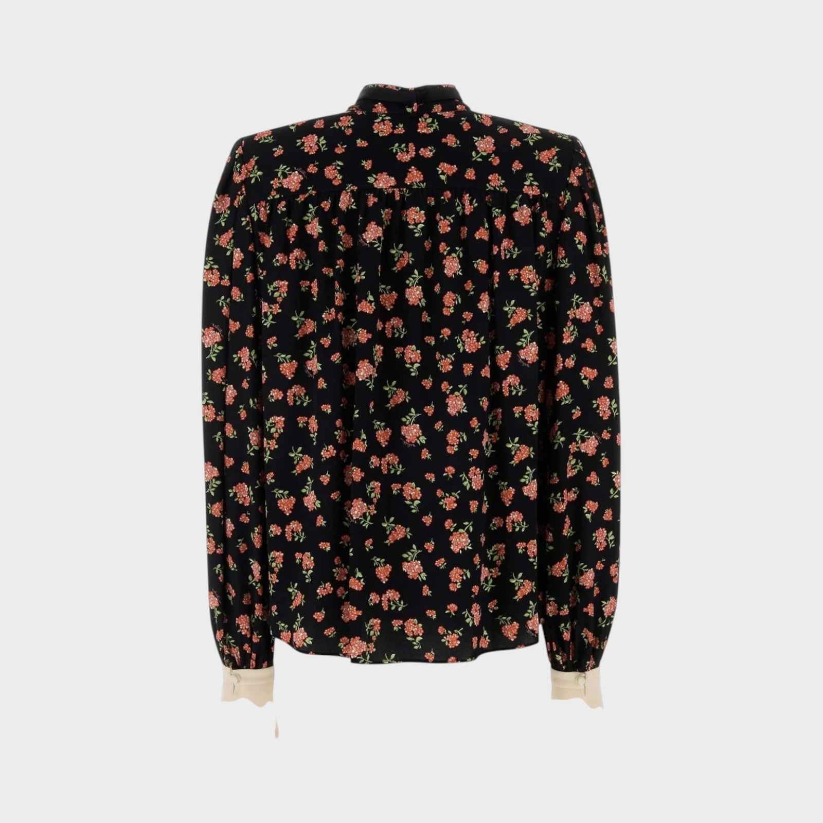 Tasoni black long-sleeve shirt with multicolor floral print and cream cuffs.