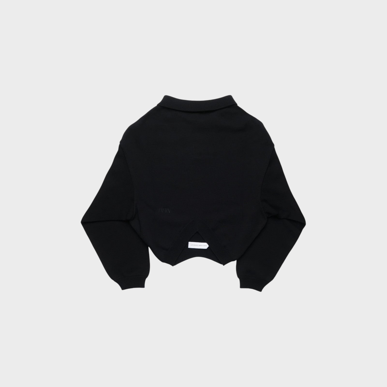Tasoni black knit polo sweater with a cropped hem and a unique V-shaped back detail.