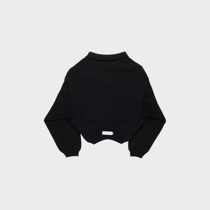 Tasoni black knit polo sweater with a cropped hem and a unique V-shaped back detail.