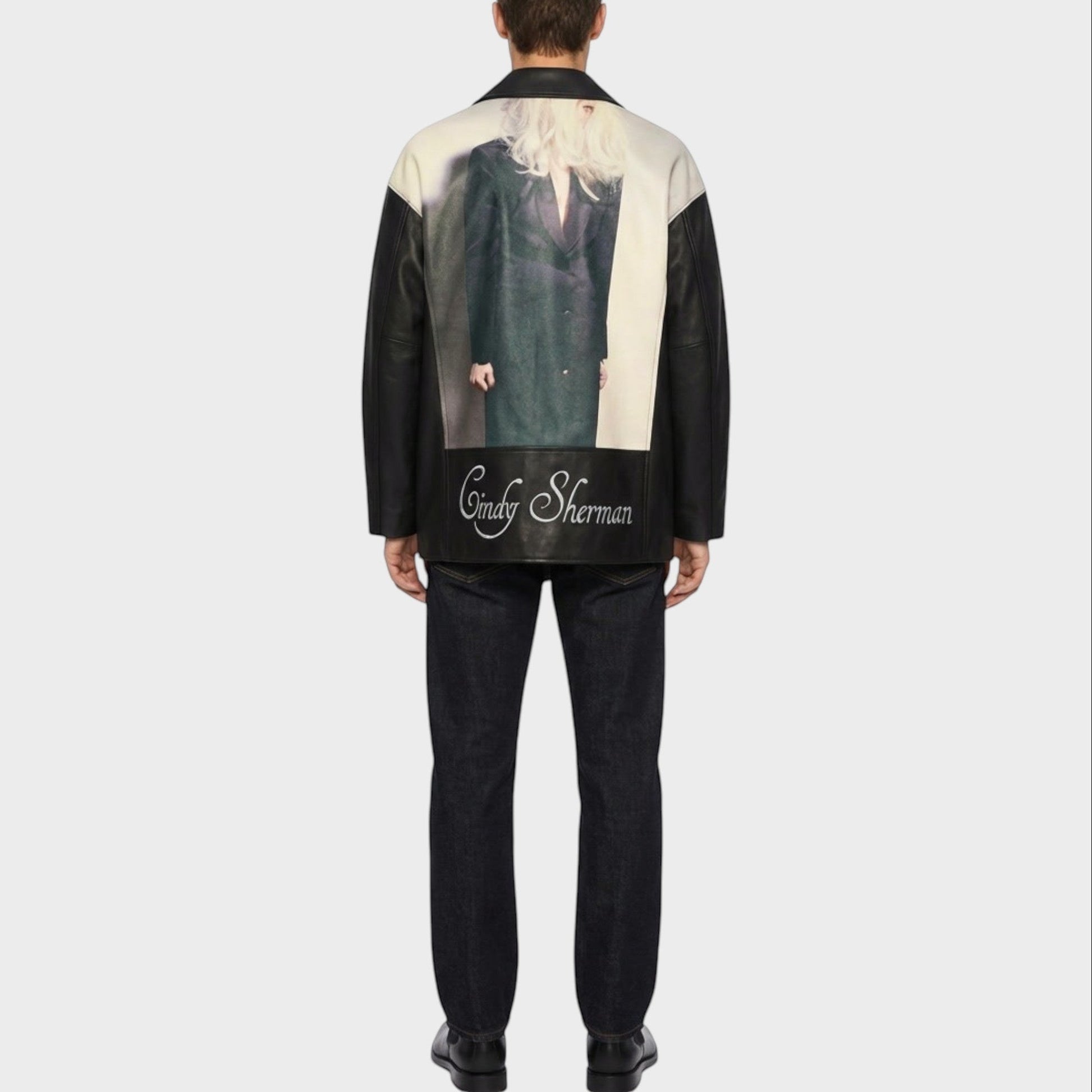 Tasoni black leather blouson coat with a Cindy Sherman print on the back and signature.