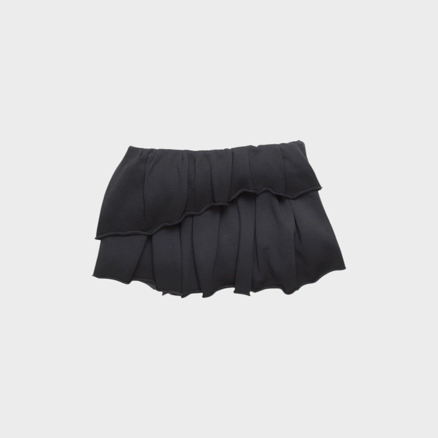 Tasoni black asymmetric pleated mini skirt with ruffled hem and elastic waistband.