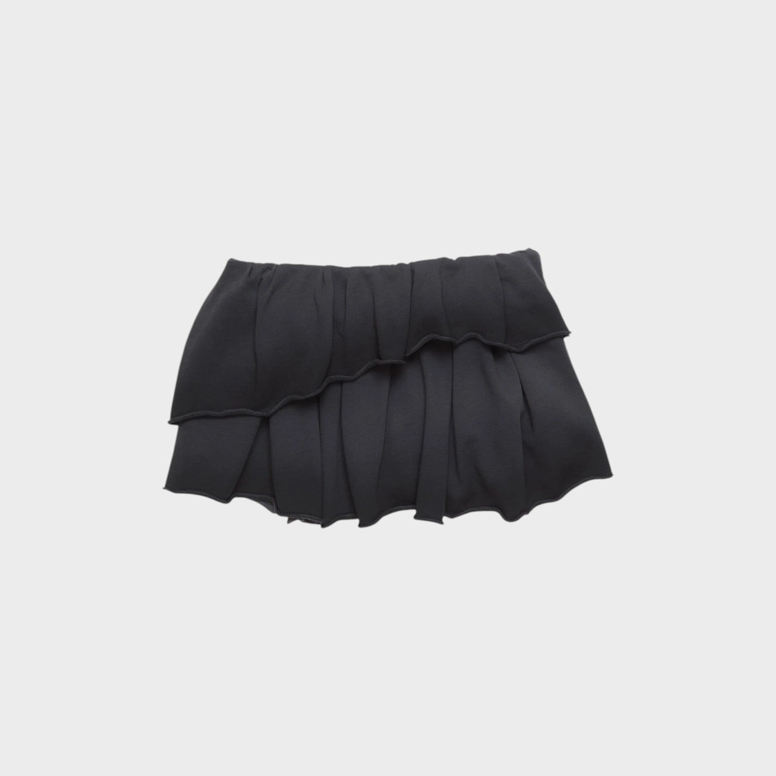 Tasoni black asymmetric pleated mini skirt with ruffled hem and elastic waistband.