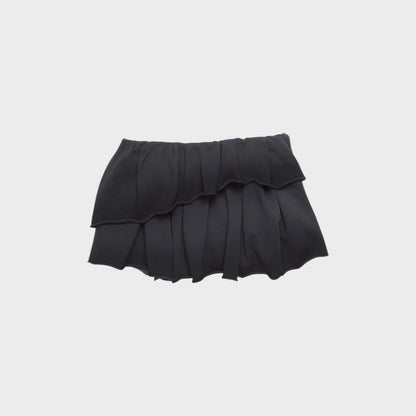 Tasoni black asymmetric pleated mini skirt with ruffled hem and elastic waistband.