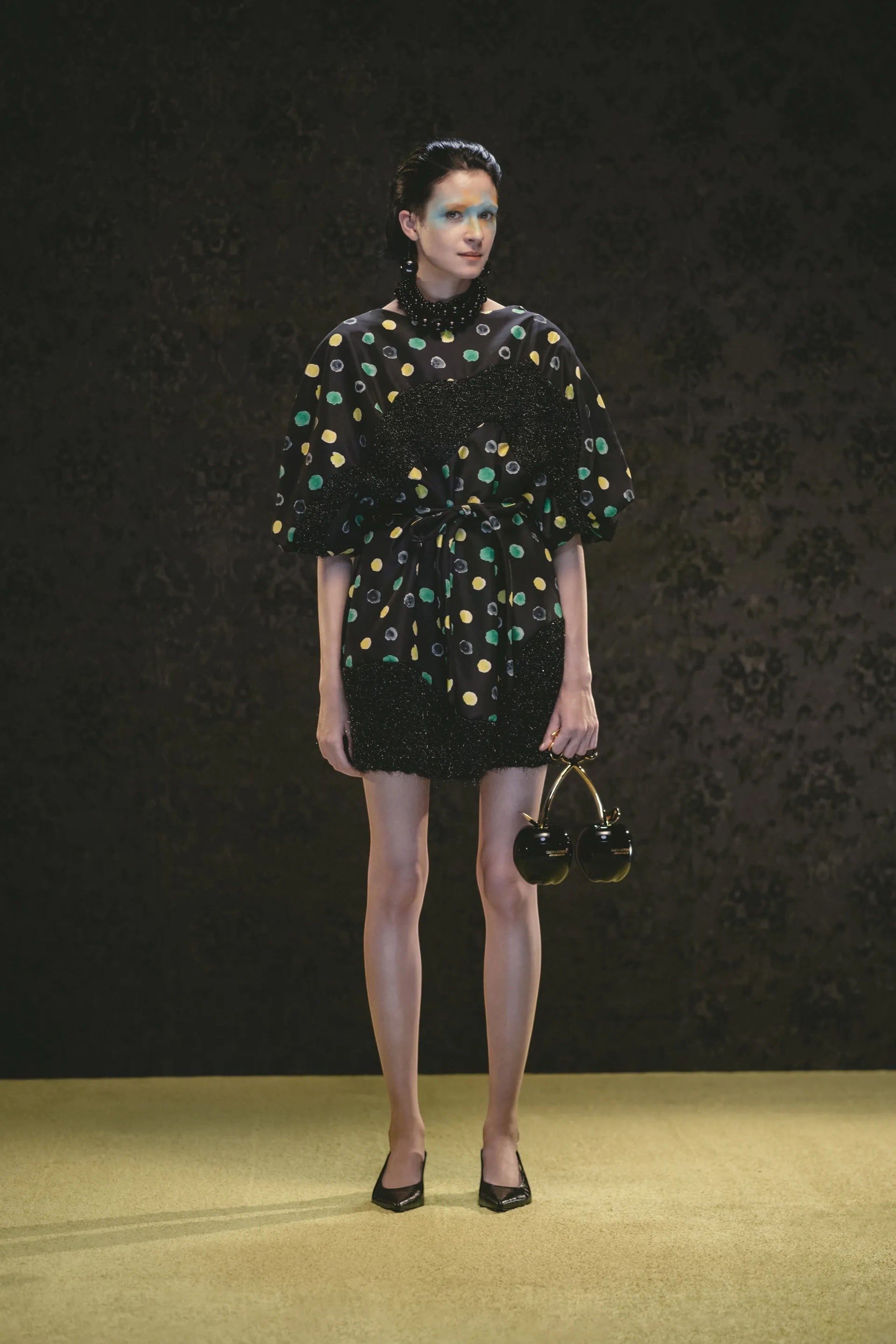 Tasoni black mini dress with yellow and green polka dots, short sleeves, belted waist, and beaded trim.