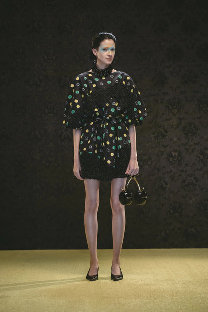 Tasoni black mini dress with yellow and green polka dots, short sleeves, belted waist, and beaded trim.