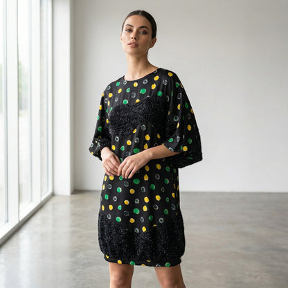 Tasoni black mini dress with yellow and green polka dots, crew neck, short sleeves, and fuzzy trim.