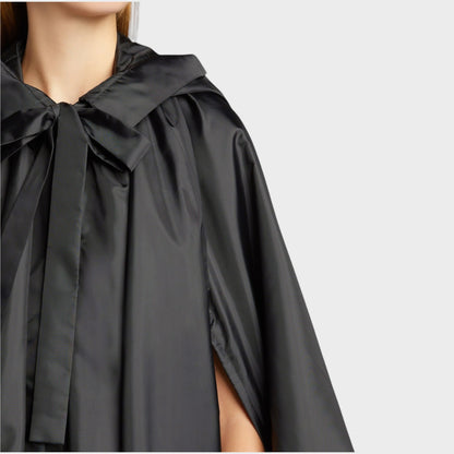 Tasoni black satin quilted tie fastening hood sleeveless jacket with side slits.