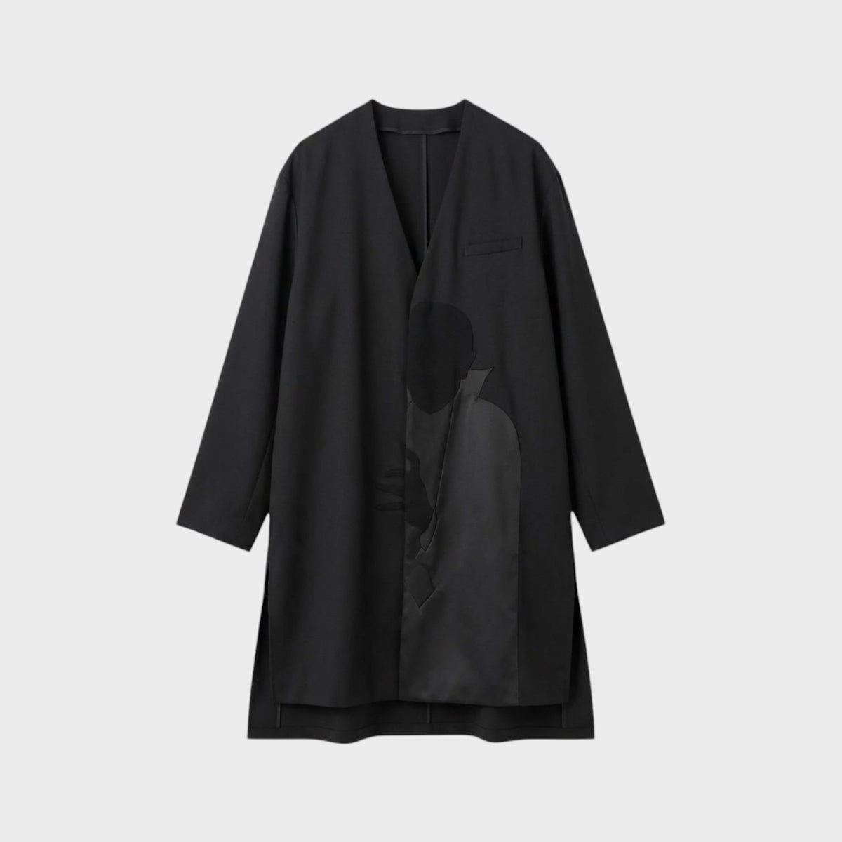 Tasoni black wool asymmetric collarless coat with a subtle Dracula motive print on the front.