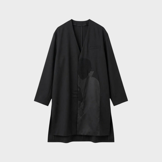 Tasoni black wool asymmetric collarless coat with a subtle Dracula motive print on the front.