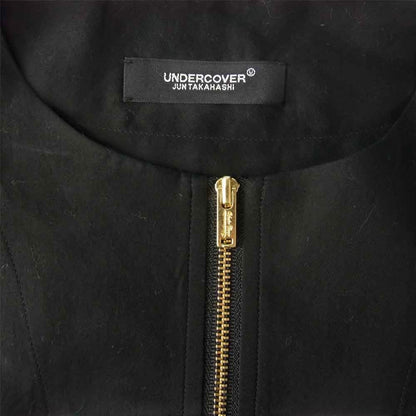 Tasoni black zip up overshirt with gold zipper and Undercover Jun Takahashi label
