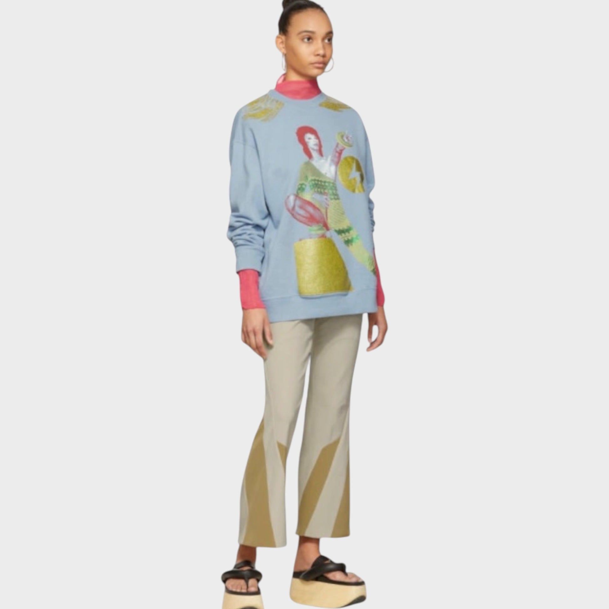 Tasoni light blue cotton crewneck sweatshirt with a colourful graphic print on the front and pink cuffs.